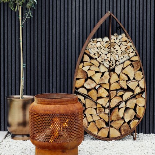 Leaf on Stand Sculptural Log Storage in Natural Rust - When You're Outdoors